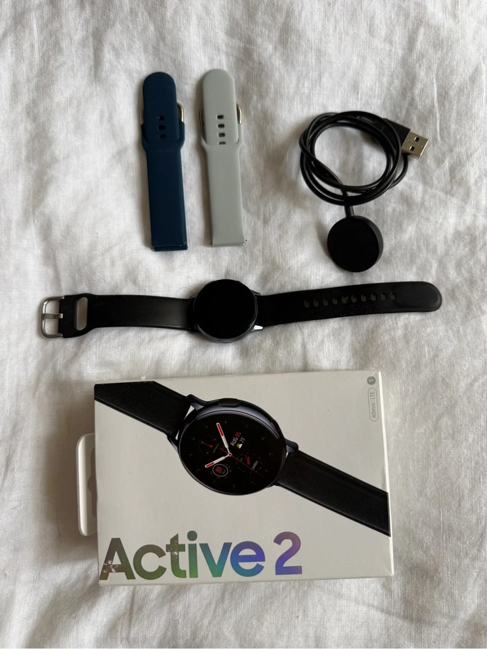 Samsung Galaxy Active2 Smartwatch with Black, Navy, and Light Gray Bands